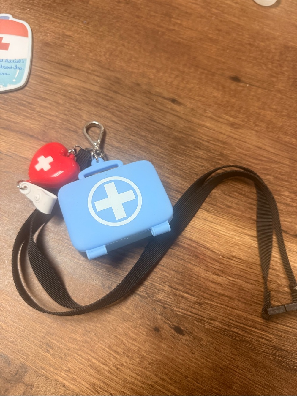 Bath & Body Works Blue First Aid Hand Sanitizer Holder with Red Heart Charm